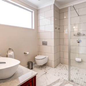 Deluxe Room Badezimmer